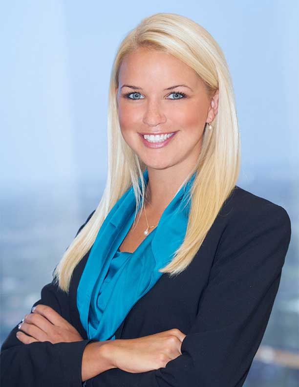Headshot Photography of Newport Beach attorney with folded arms smiling in office