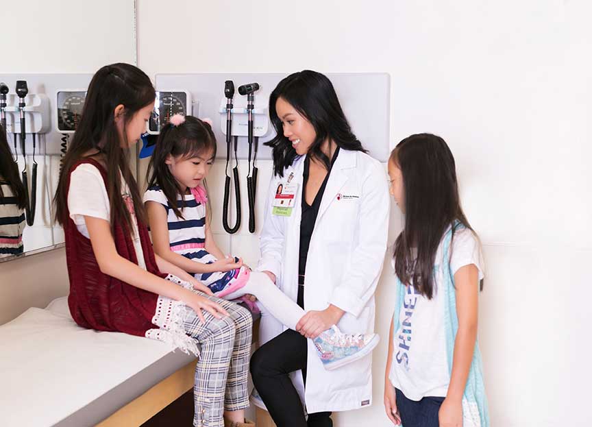image of female doctor with children Newport Beach 